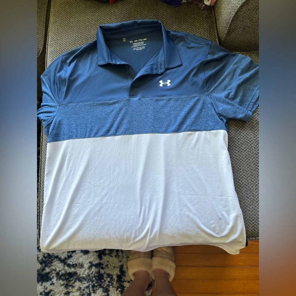 Men’s under armour polo. Never worn